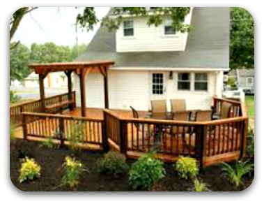 East Moline deck stained and sealed by That British Painter and a custom Pergola added to enhance the space